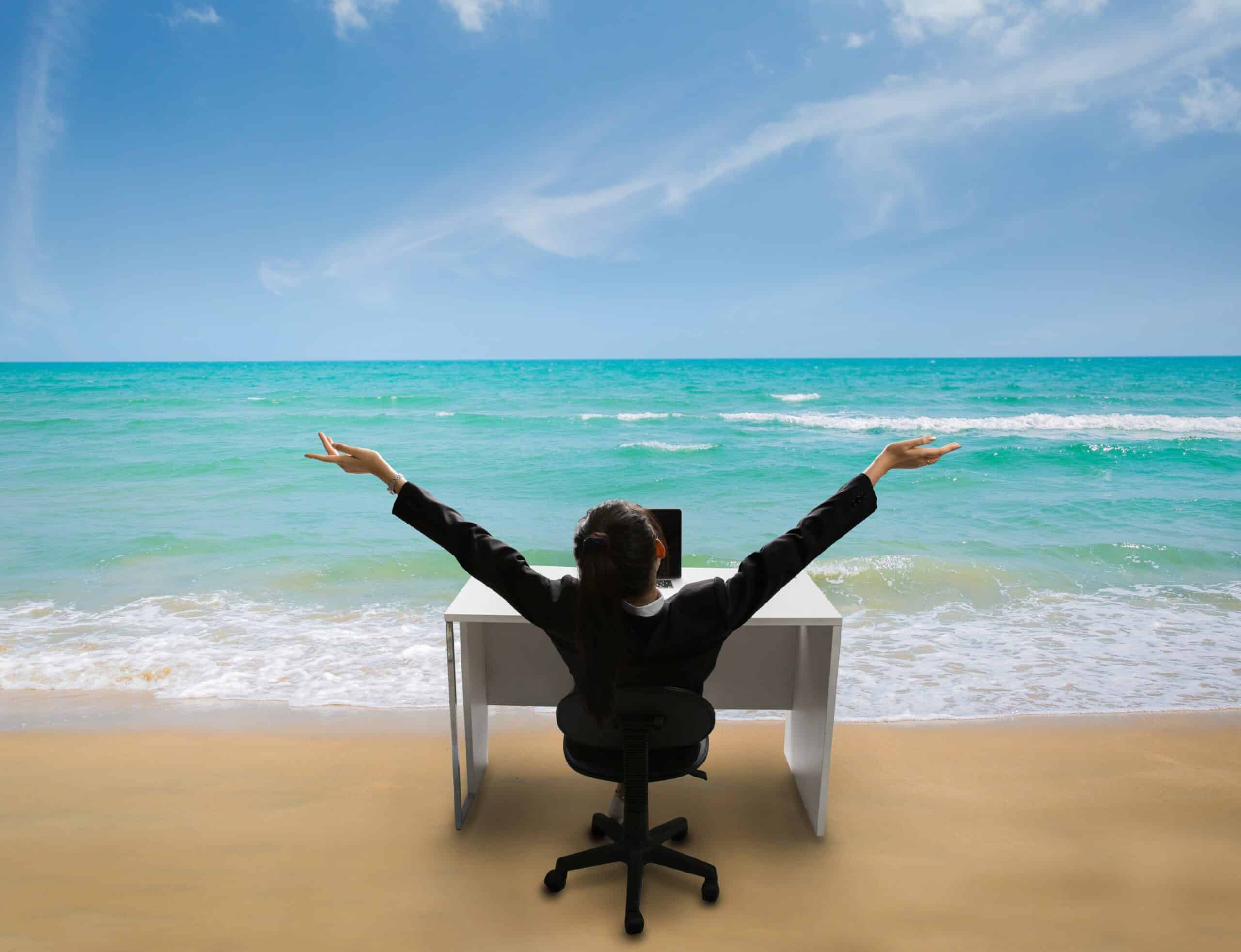 business woman on beach using west palm beach scanning