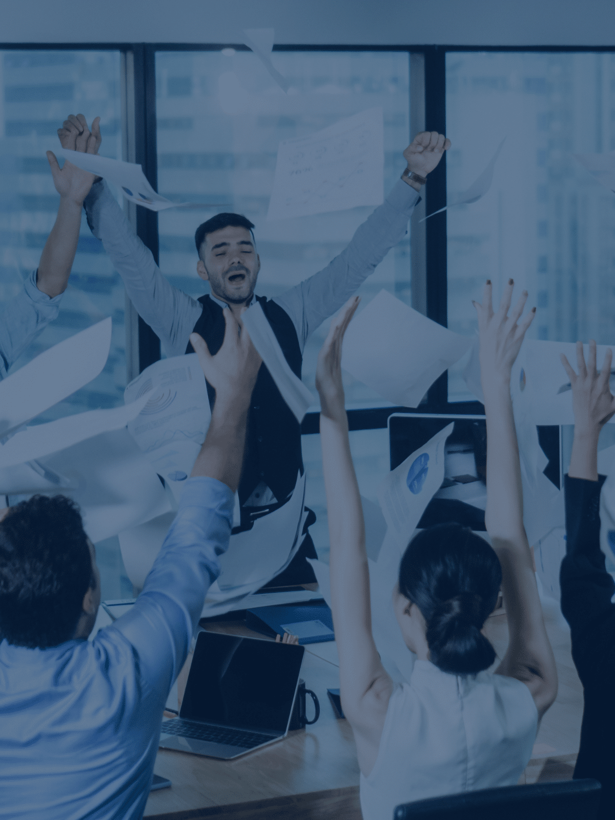 employees throwing documents after using Miami document scanning services